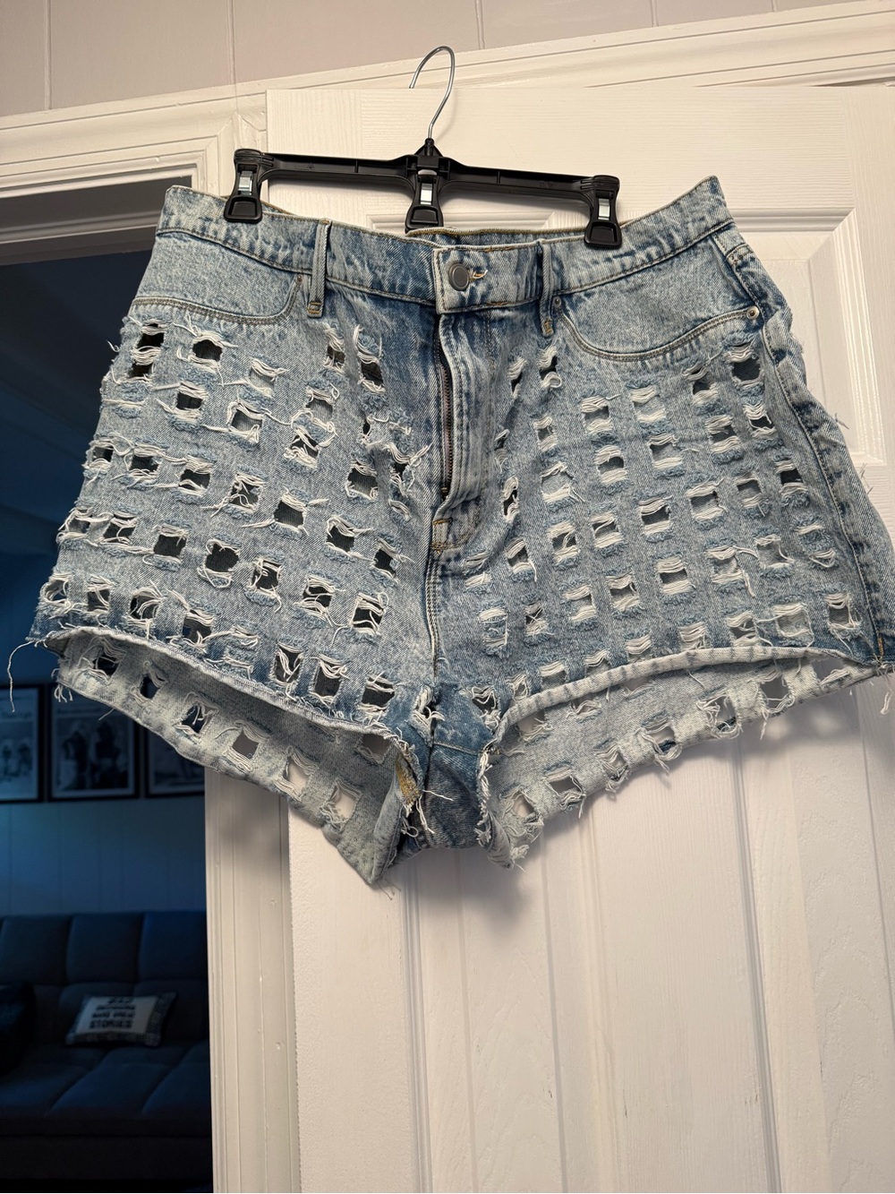 Good American Light Wash Distressed Lattice Denim Shorts